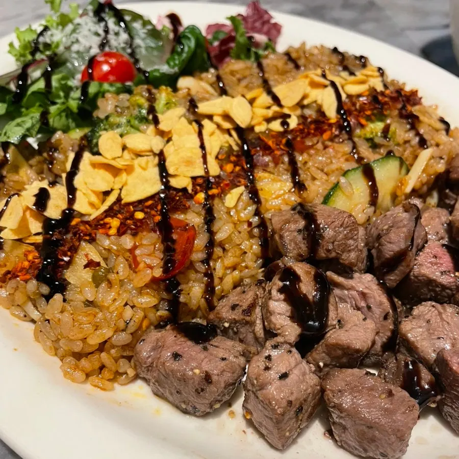 Picking up a piece of steak