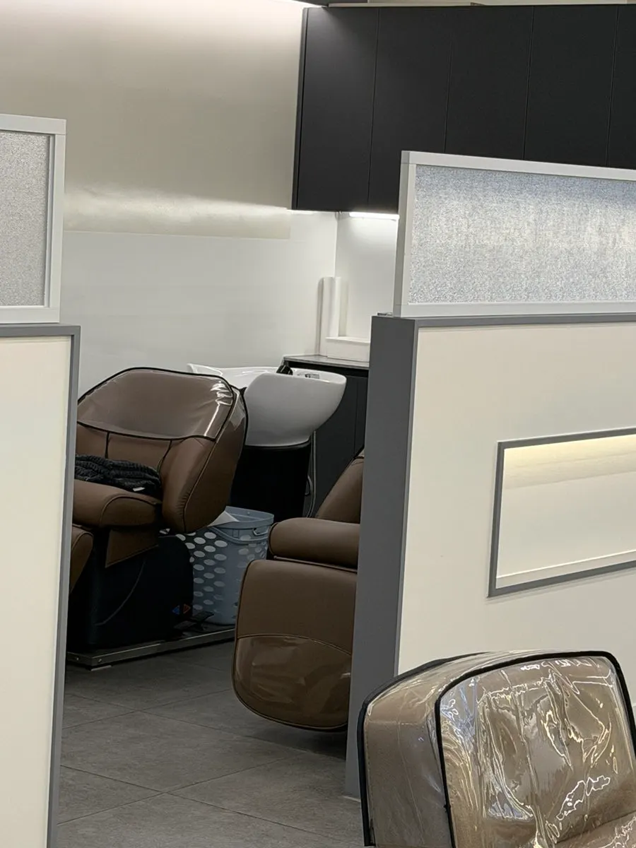 Interior with widely spaced styling chairs