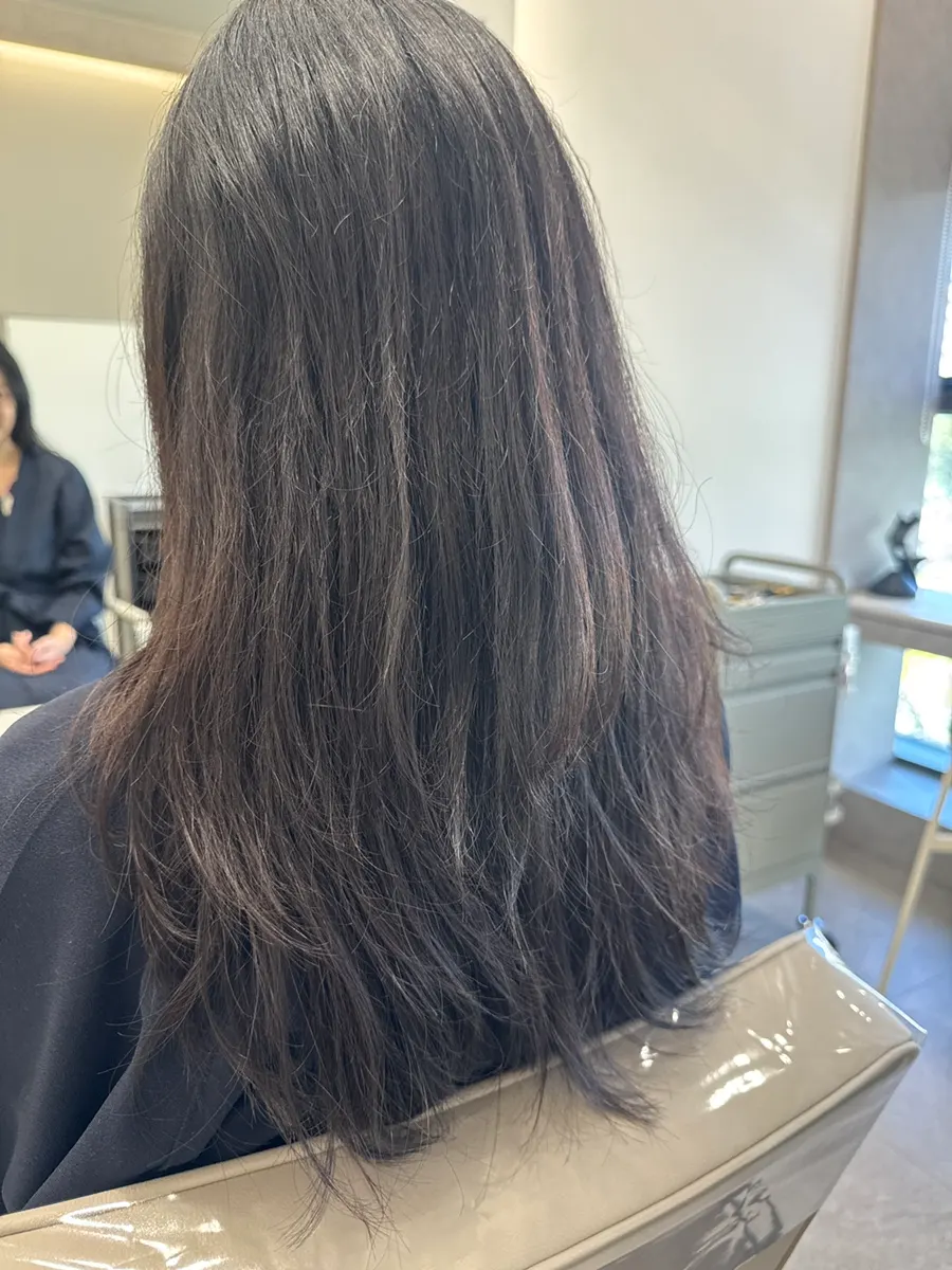 Back view showing hair condition before the perm