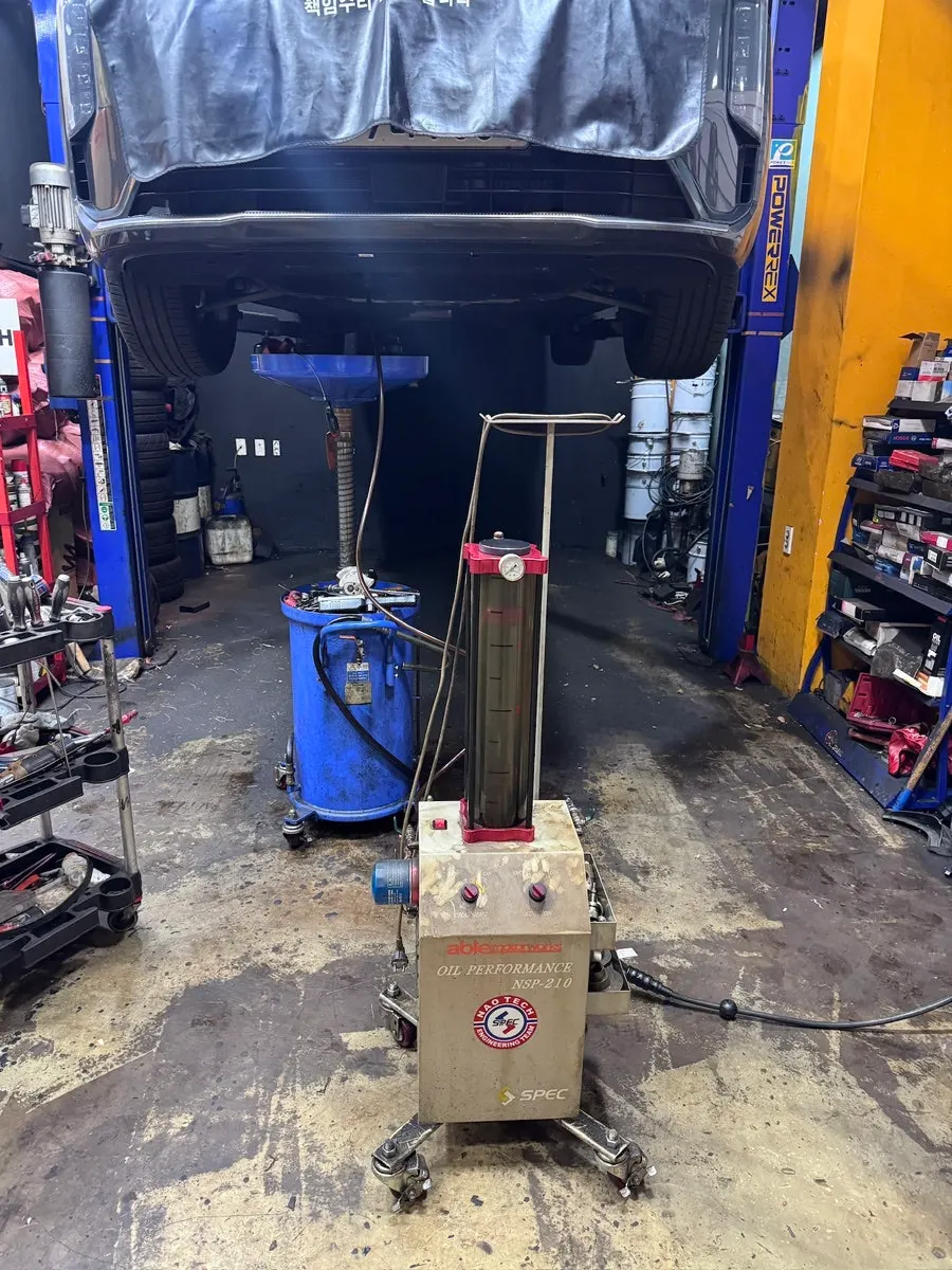 Engine oil flushing with NSP-210 equipment