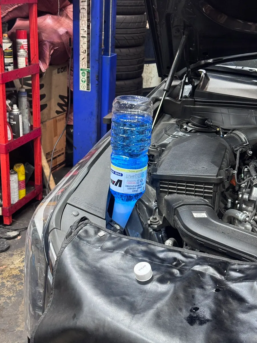 Checking fluid levels after the oil change