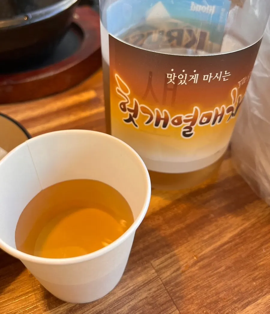 A cup of heotgae fruit tea served after ordering