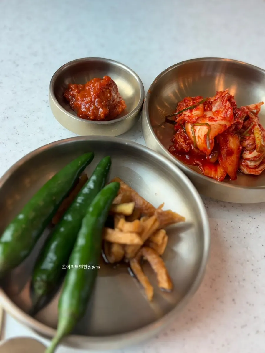 Kimchi and pickled radish at the self-serve bar