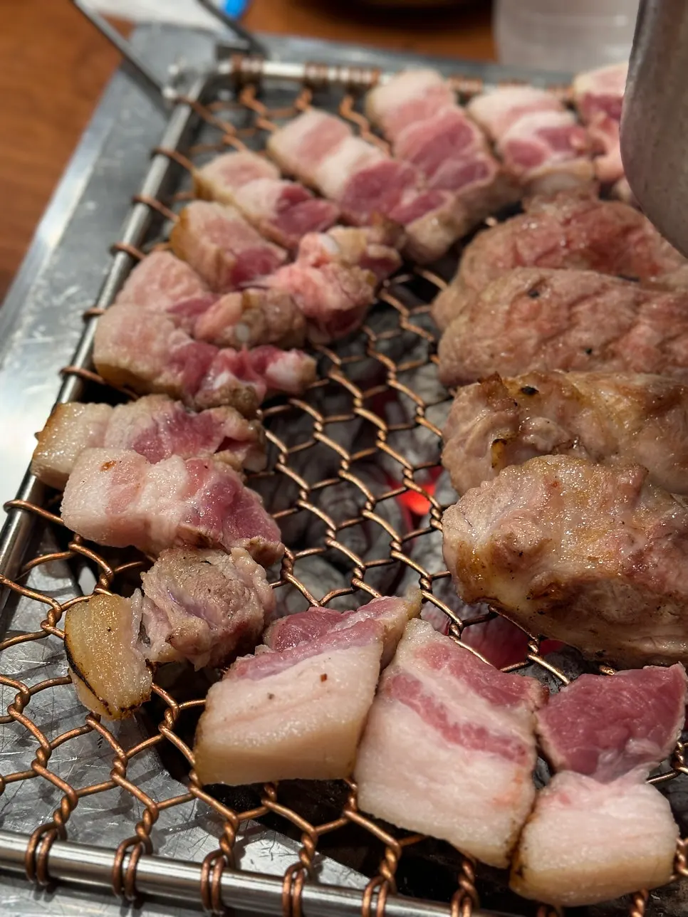 Staff grilling the black pork geun-gogi