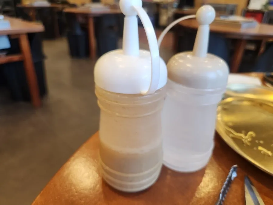 비빔회냉면과 흑돼지 한 점