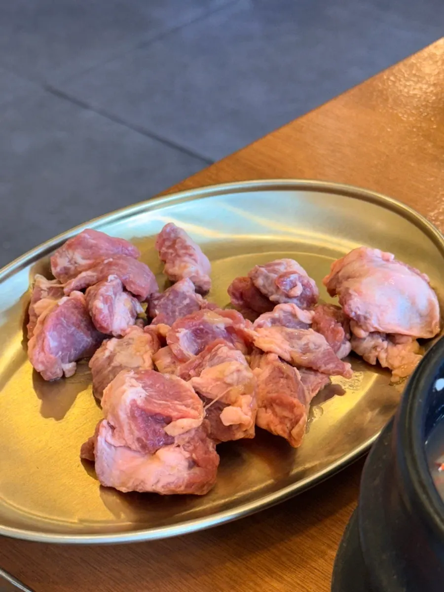 Black pork served with meljeot and ssam wraps