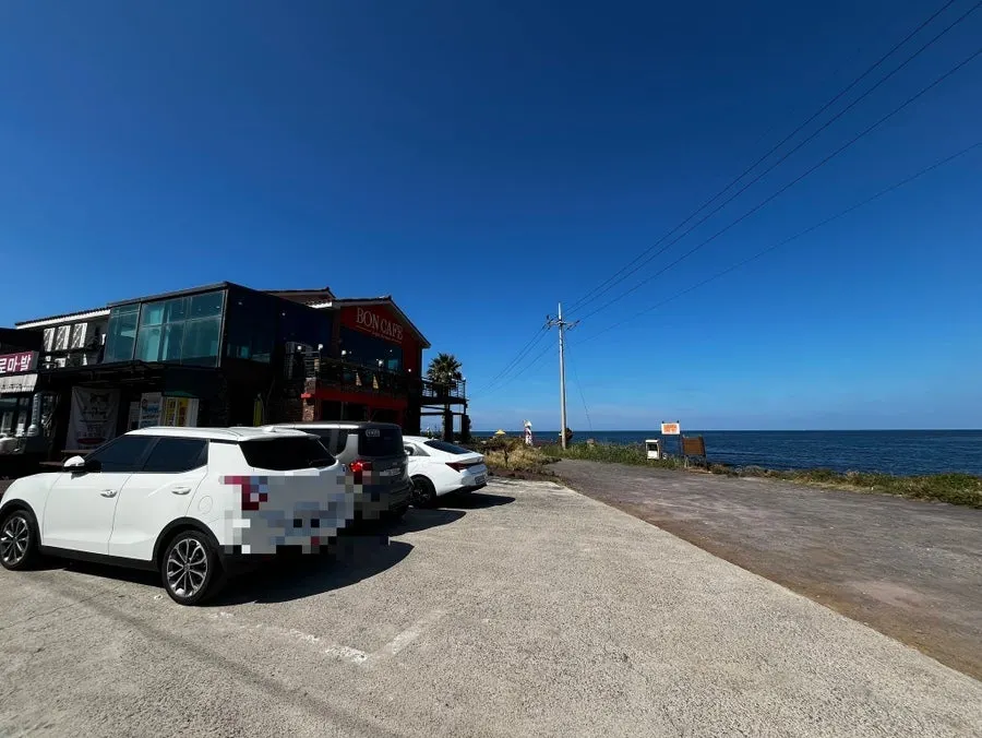 Aewolbon Café building with private parking beside it