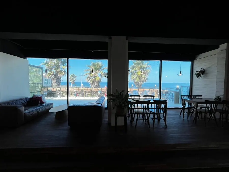 Warm interior of Aewolbon Café with the ocean view