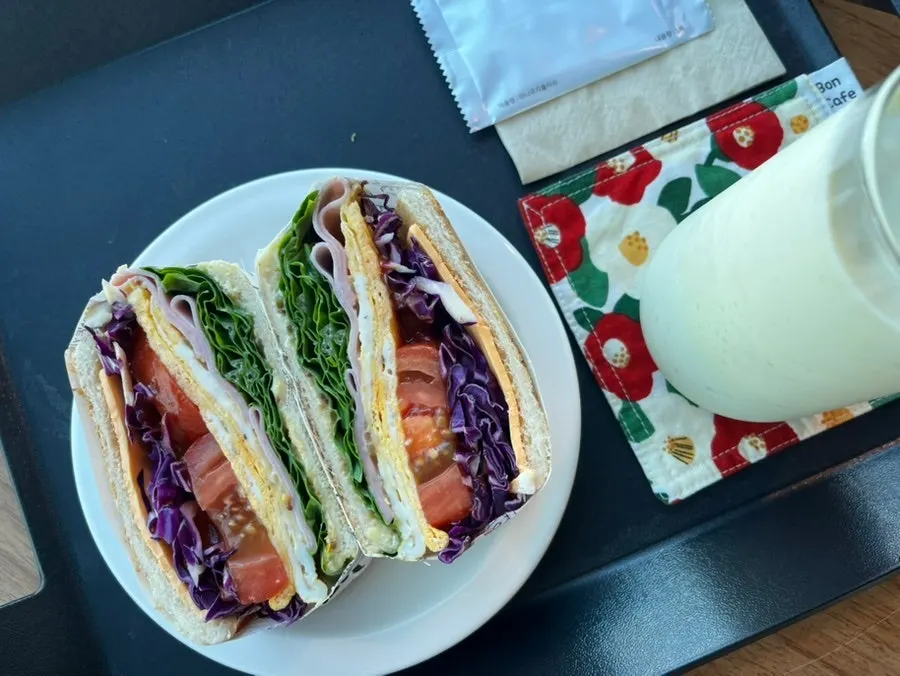 Cross-section of the ham and cheese sandwich showing generous fillings