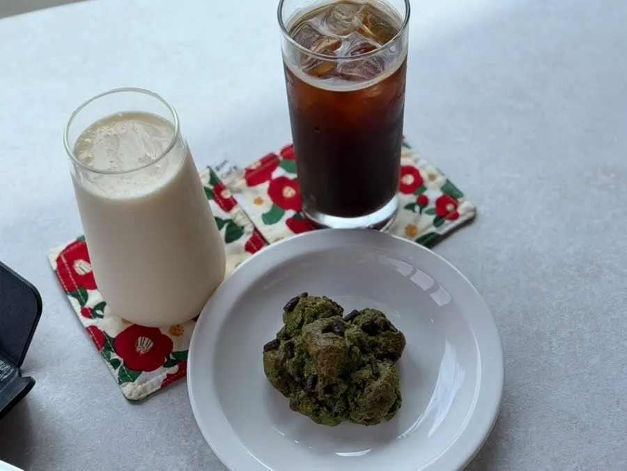 Café table with drinks and dessert together