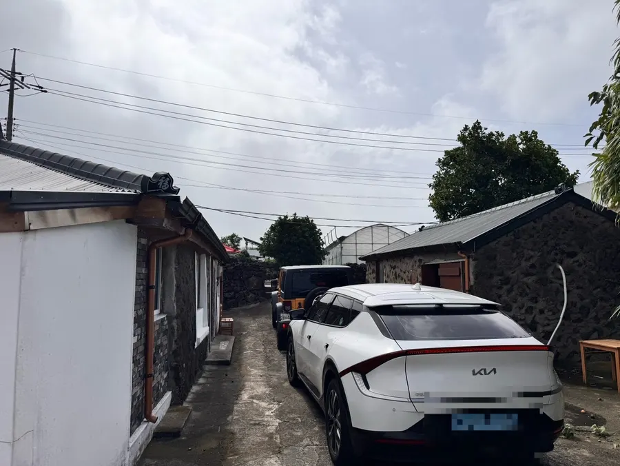Parking area in front of the studio building