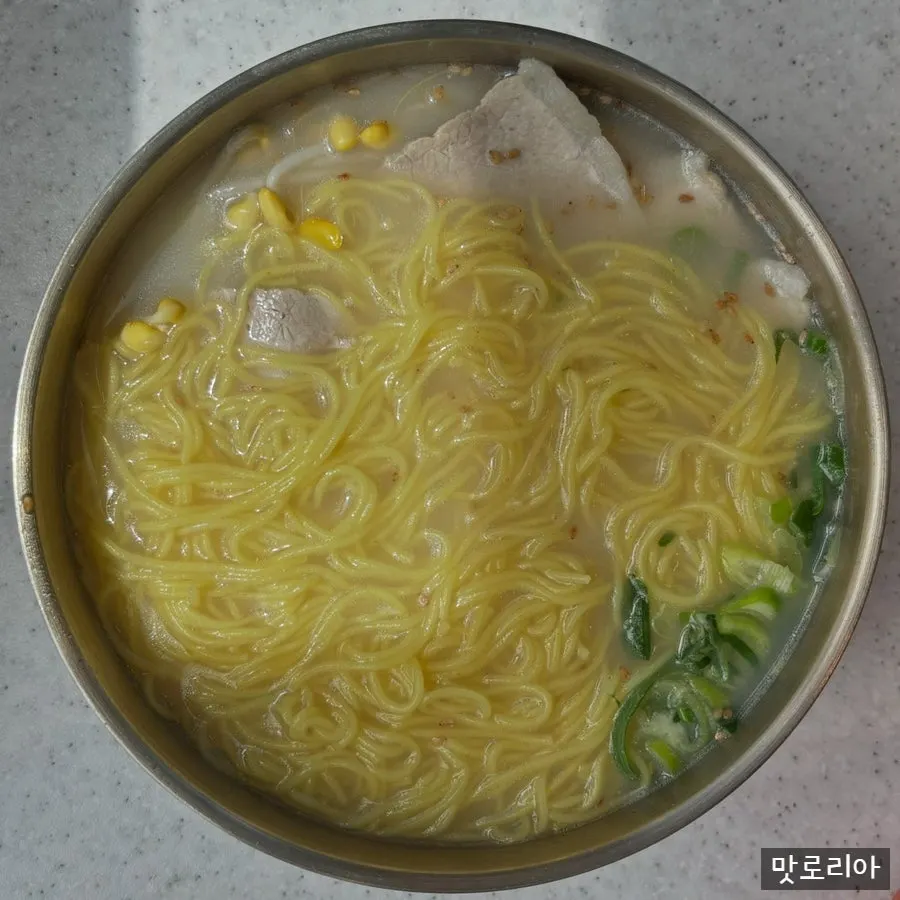 Handam Guksu beef bone broth pork noodle dish