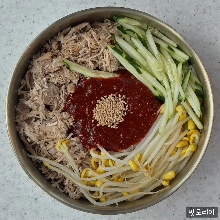Dongchimi bibim noodles served with cool broth