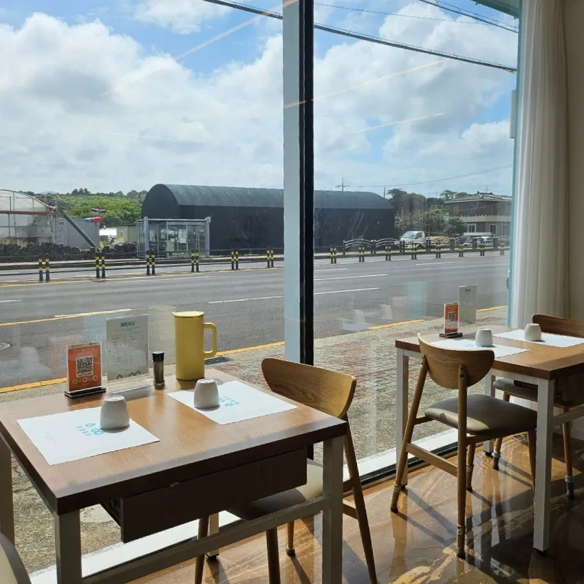 Café-like interior tables at Aewol Eomma