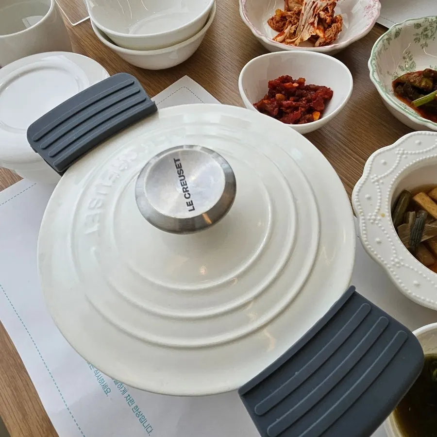 Aewol Eomma hangover soup served in a cast-iron pot with a handle cover
