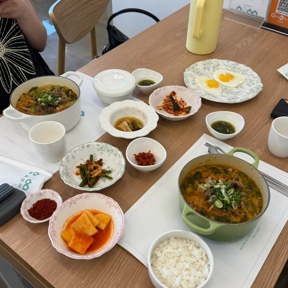Aewol Eomma breakfast table set with soup, rice, and side dishes