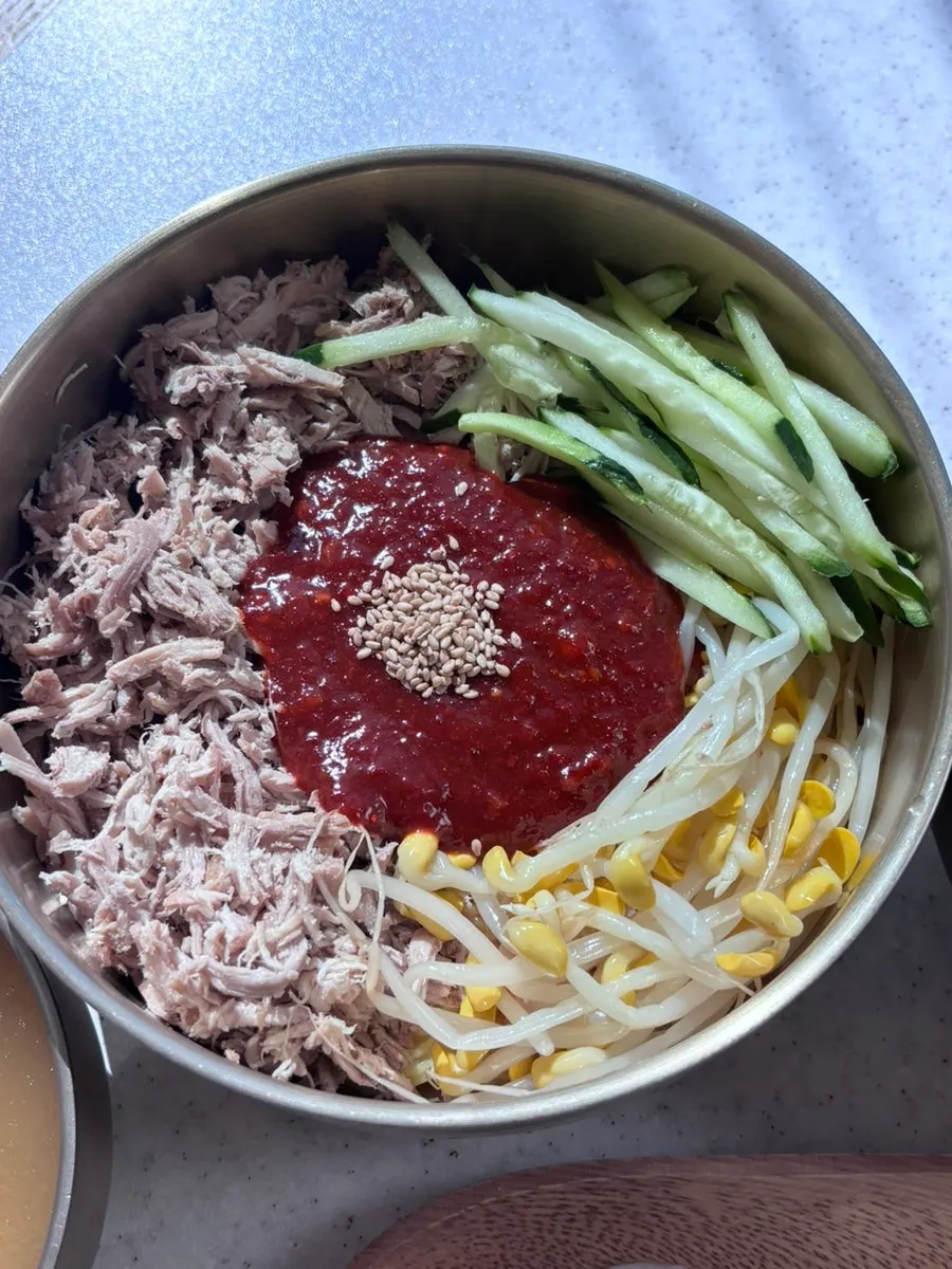 Bibim guksu with dongchimi broth poured in
