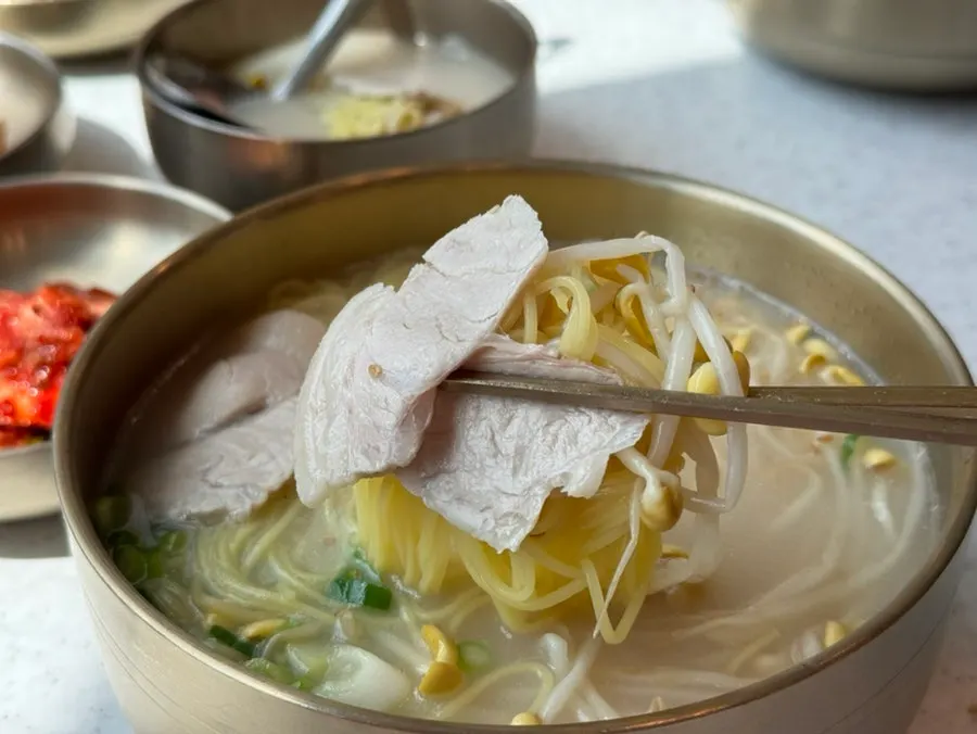 Close-up of tender pork topping