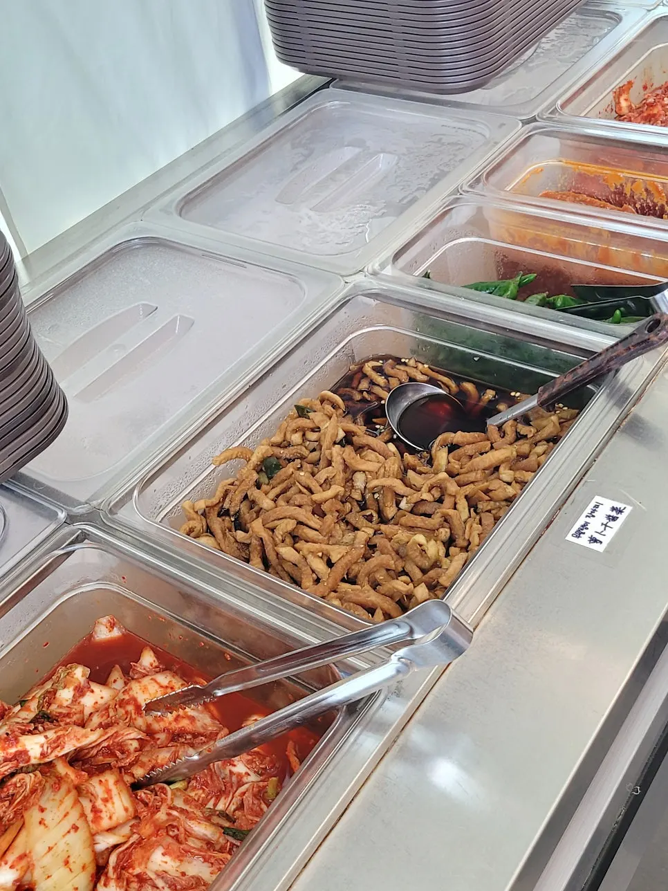 Self-serve bar with kimchi and pickled radish