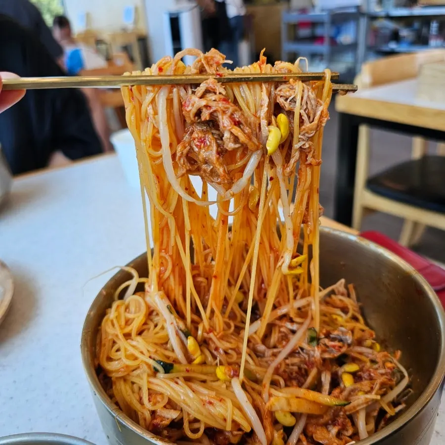 Mala pork noodles with added pepper and chili flakes
