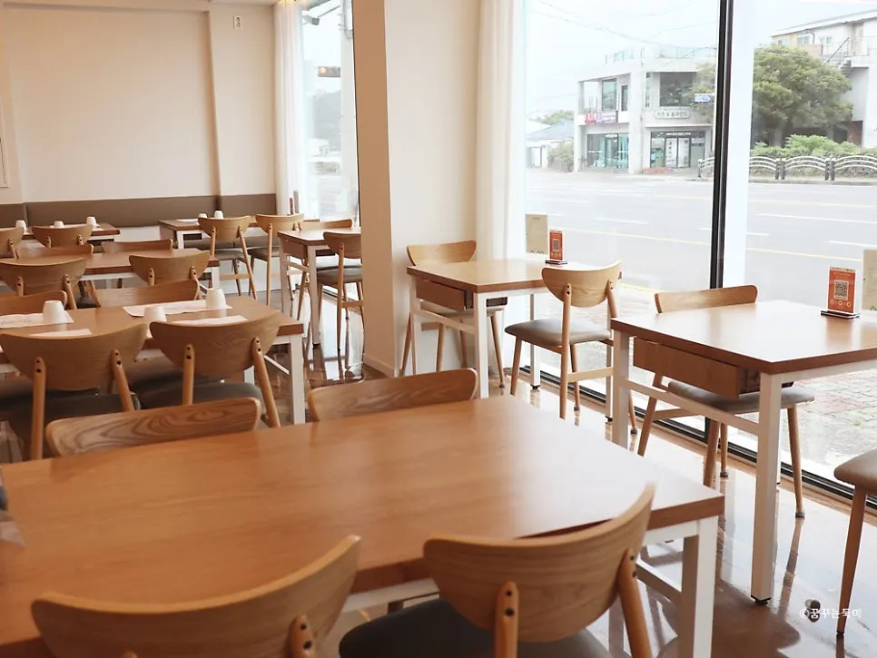 Neatly arranged tables at Aewol Eomma