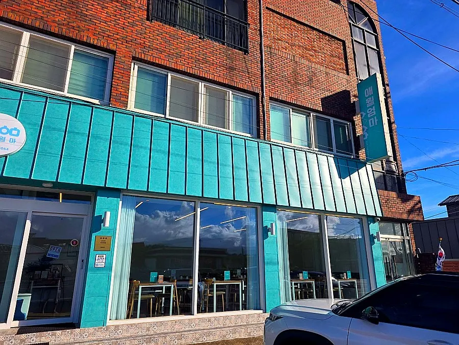 Aewol Eomma building decorated in teal