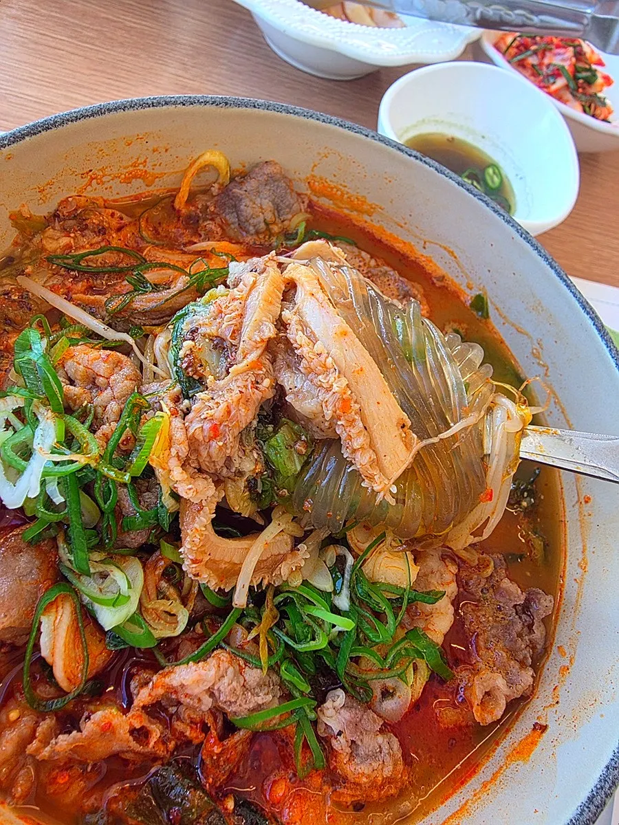 Close-up of Aewol Eomma's hangover soup loaded with meat and vegetables