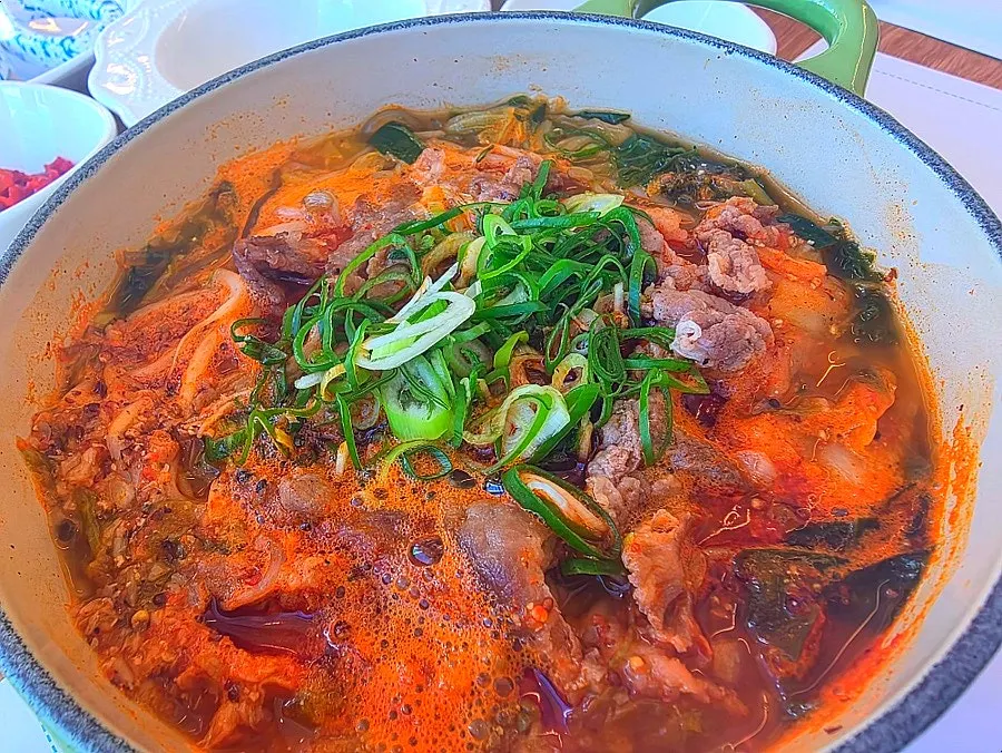 A spoonful of Aewol Eomma's hangover soup with rice mixed in