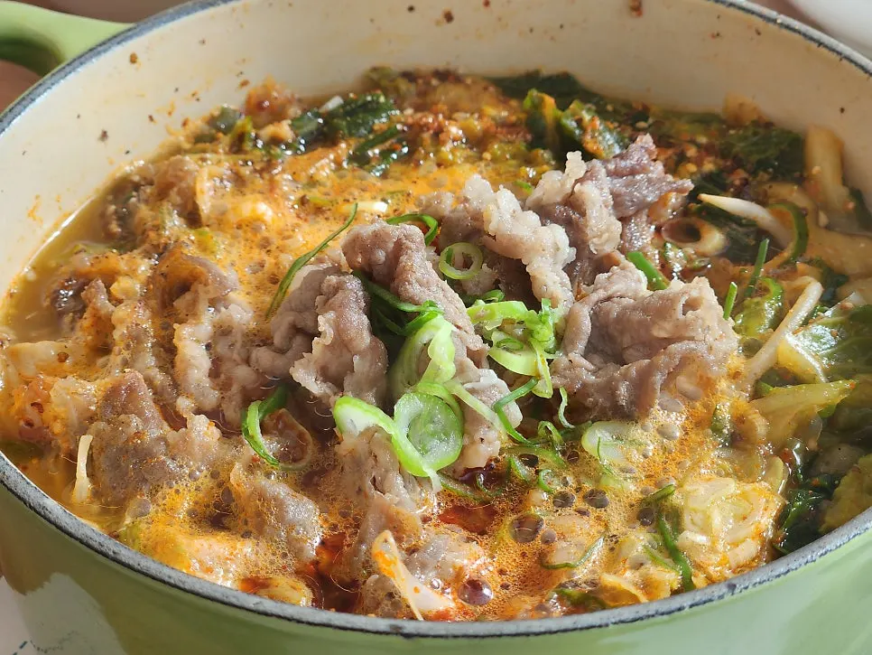 Close-up of Aewol Eomma Haejangguk with brisket and bean sprouts