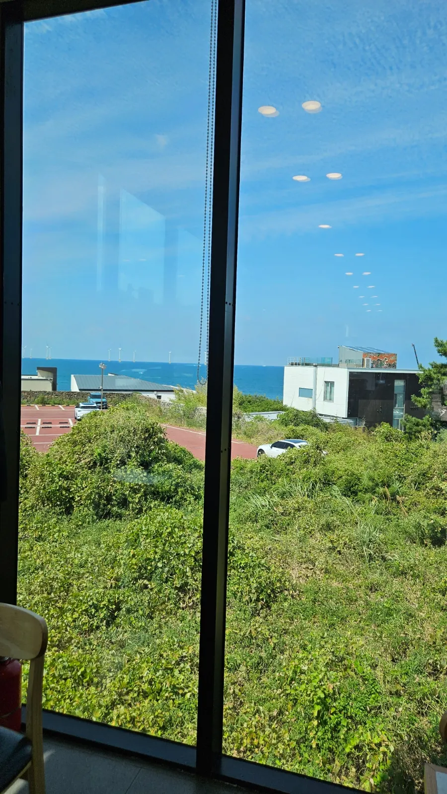 View of the Aewol sea through the floor-to-ceiling window