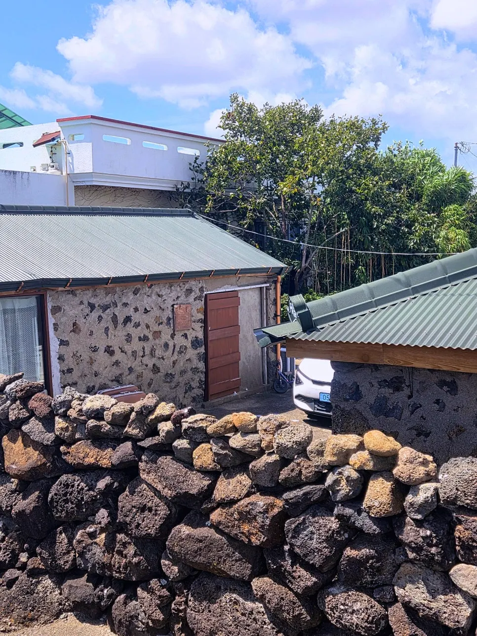 Stone warehouse-style studio below the stone wall