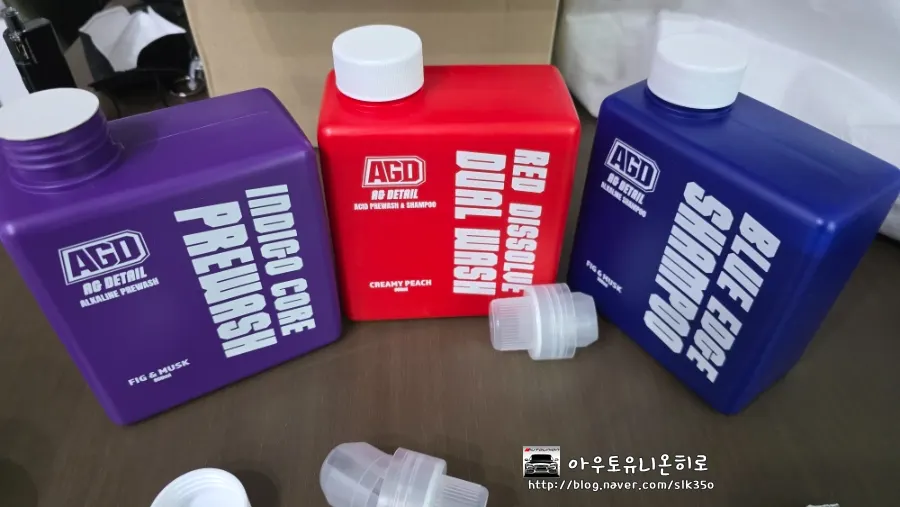 Checking the inner seal of a cube-shaped car-wash bottle