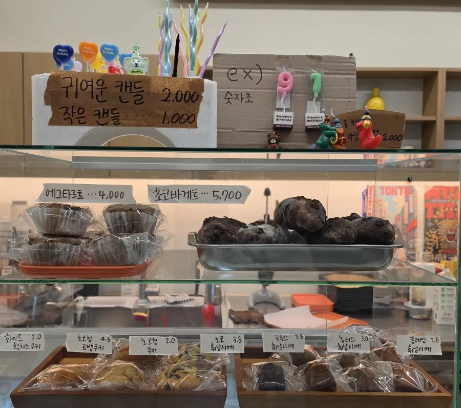 Display of baked goods such as egg tarts and cookies at Jo Hui-tak Coffee