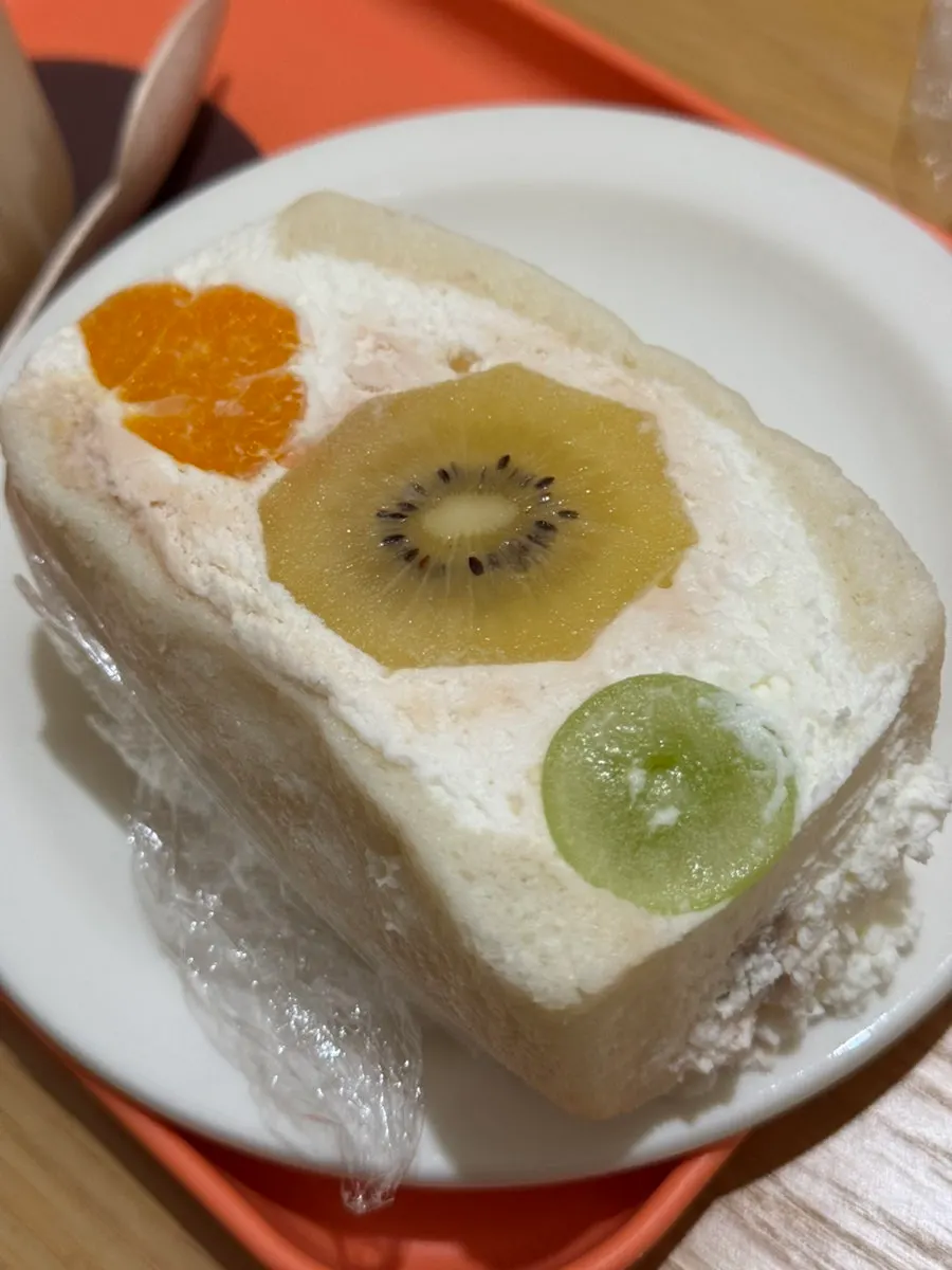 Close-up of whipped cream and fruit filling