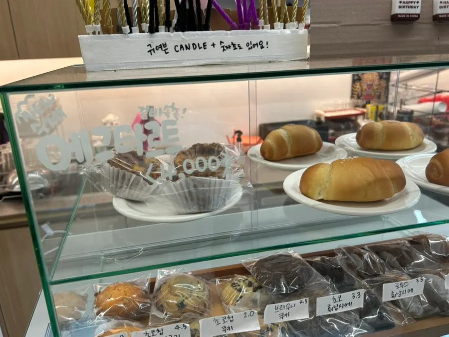 Display case with pastries and cakes