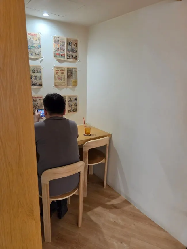 Bright wood-toned interior of Jo Hui-tak Coffee