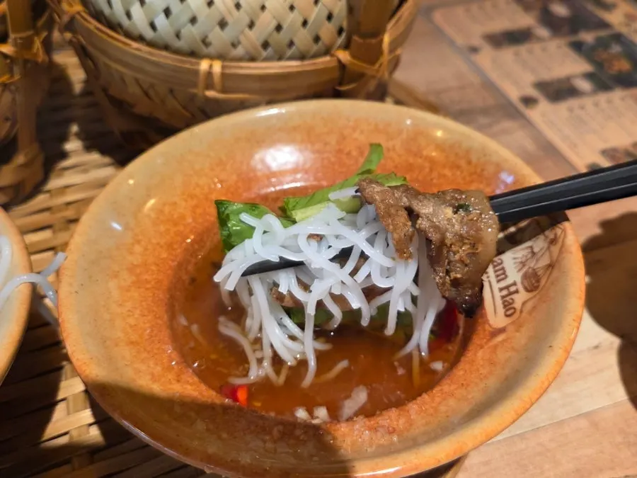 Bun cha noodles and pork dipped in nuoc mam sauce