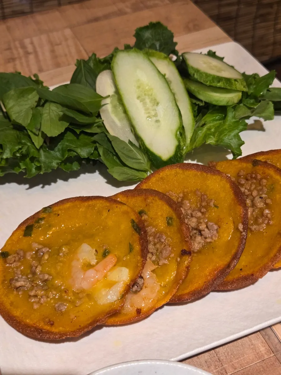 Banh khot, a Vietnamese mini rice pancake topped with shrimp
