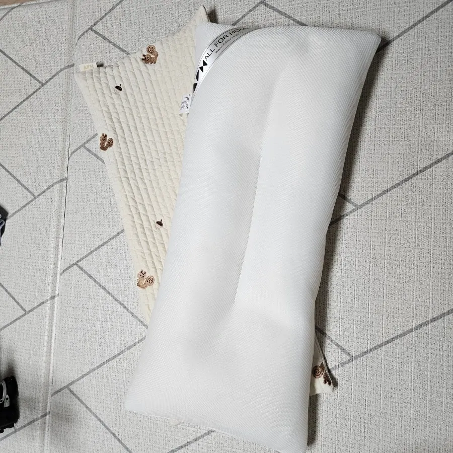 Fluffy wide pillow with its cover on