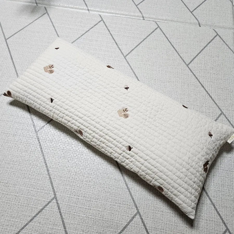 Wide pillow in use for a child