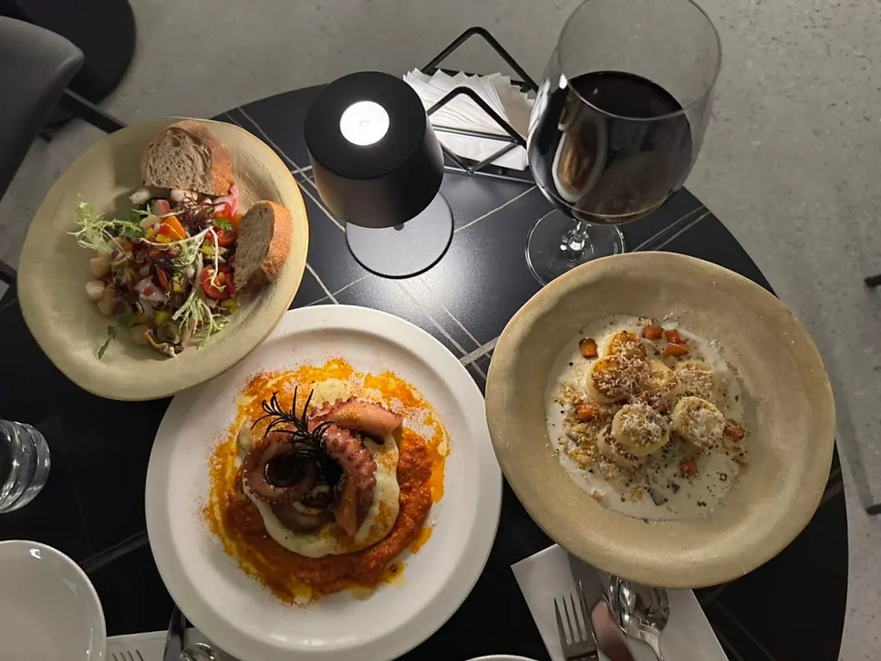 Order screen showing seafood salad, polpo, and gnocchi