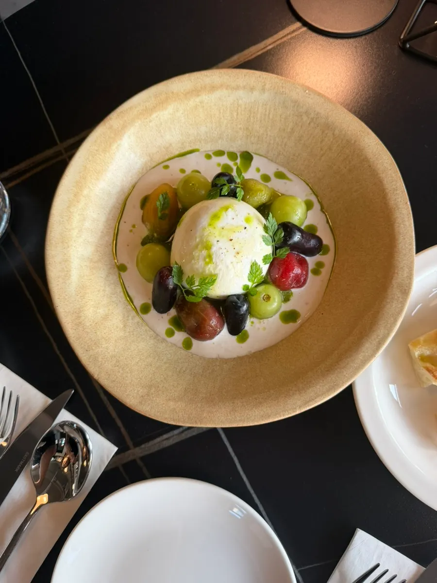 Plate of Allegro's burrata salad