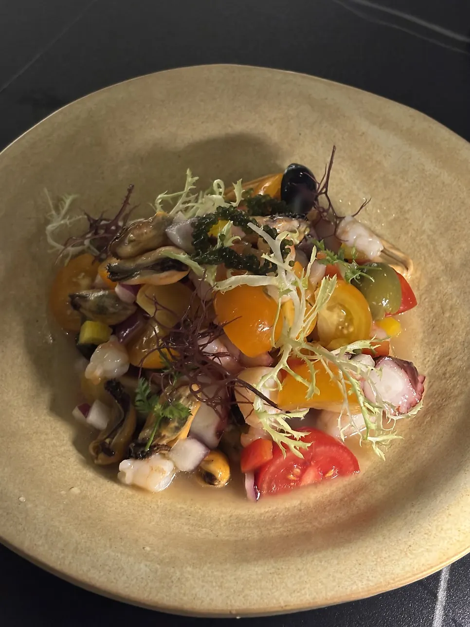 Seafood salad with sea grapes and lime dressing