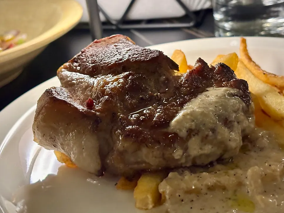 Cross-section of a thick-cut sous-vide pork shoulder steak