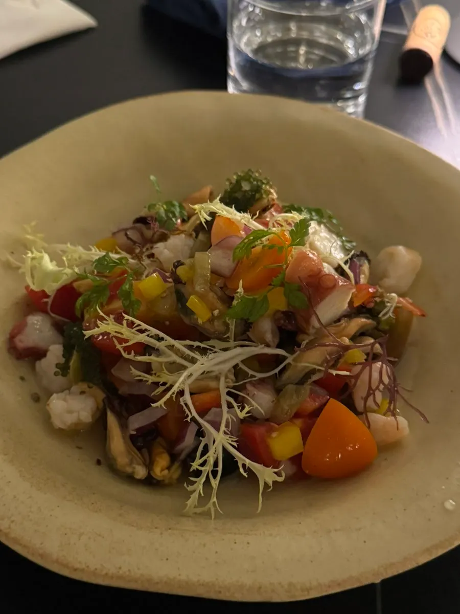 Portion of seafood salad served onto a plate