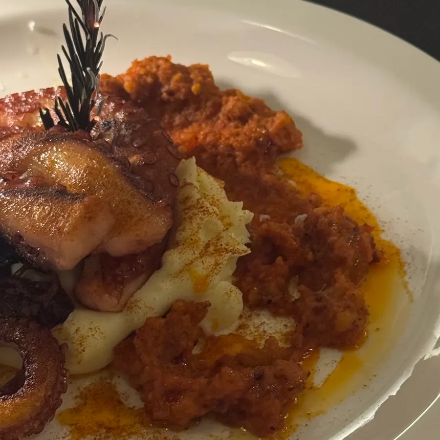 Pollo served with romesco sauce