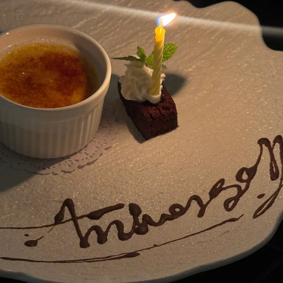 Sugar-coated crème brûlée next to the lettering dessert