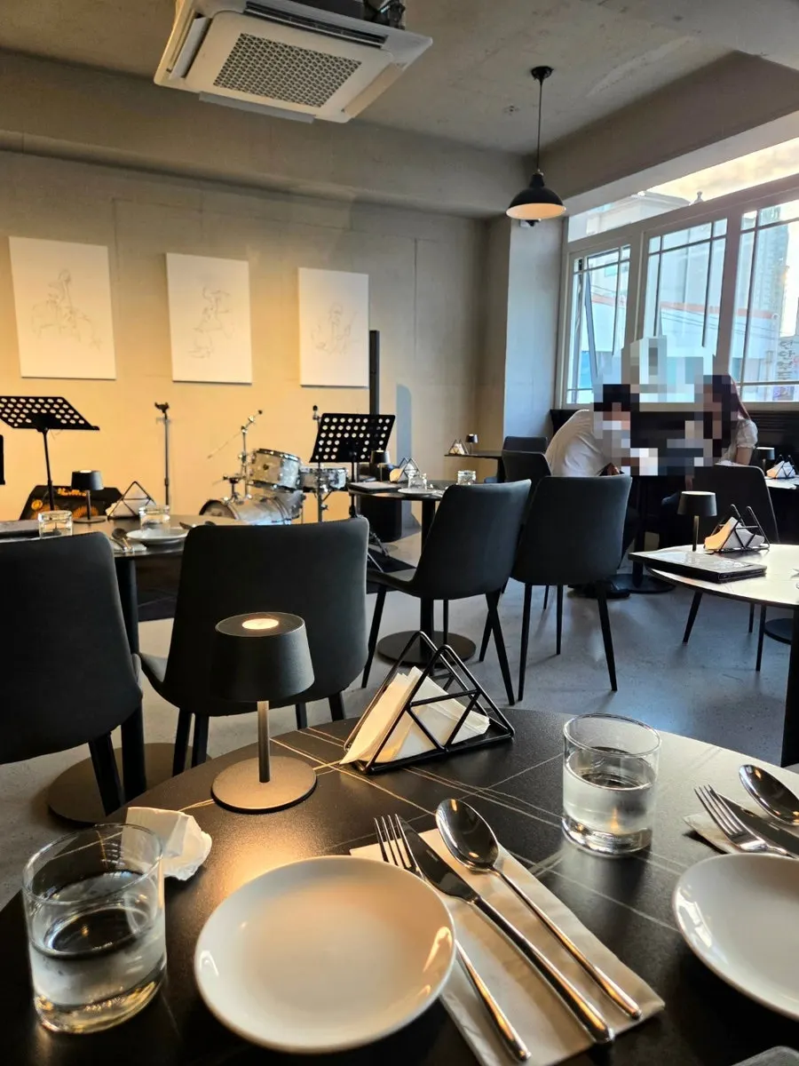 Dedicated live performance space on one side of the restaurant