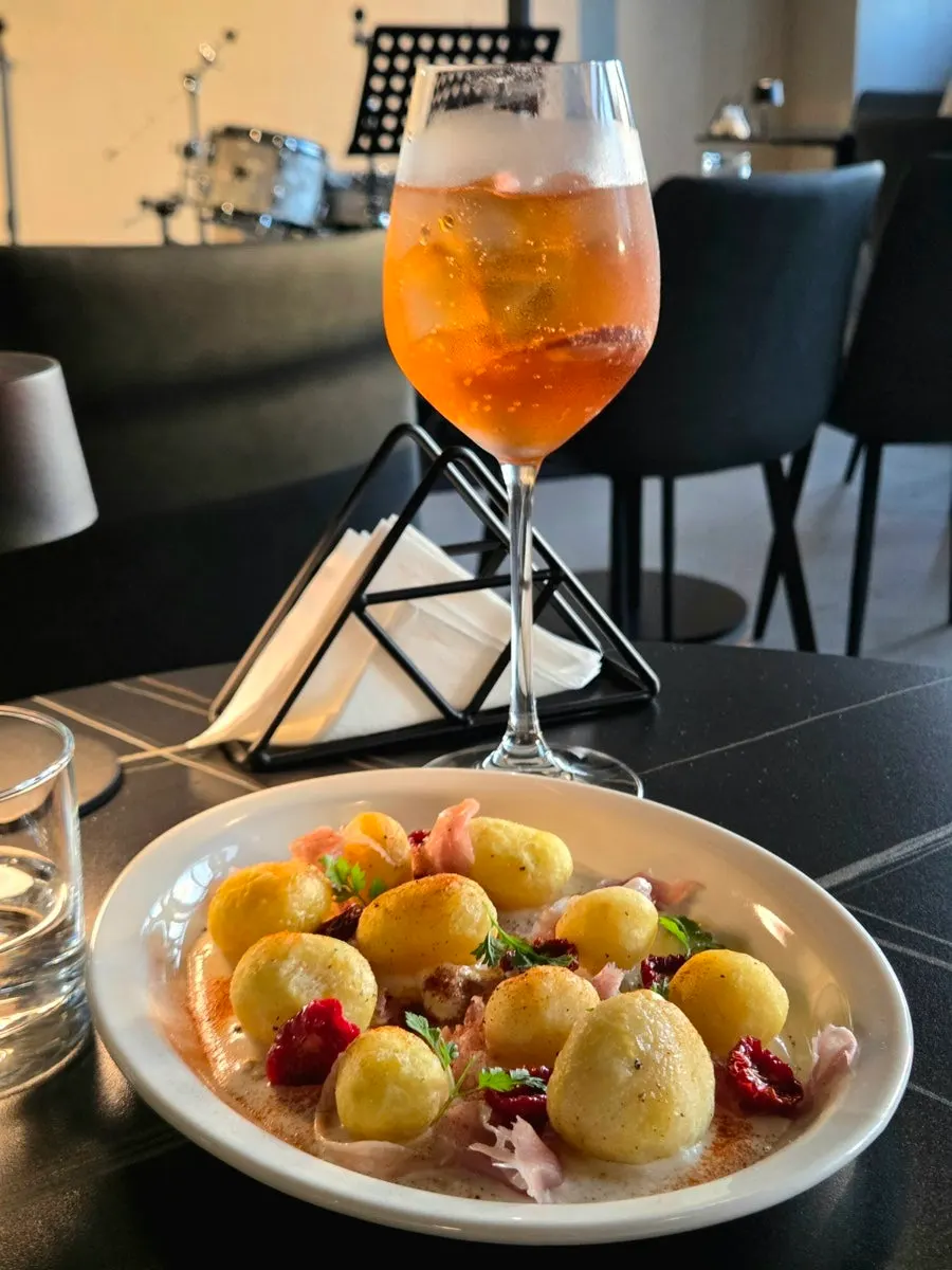 Prosciutto potato salad served first
