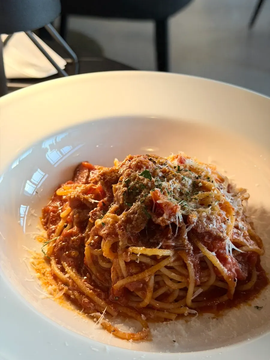 Noodles coated in amatriciana sauce